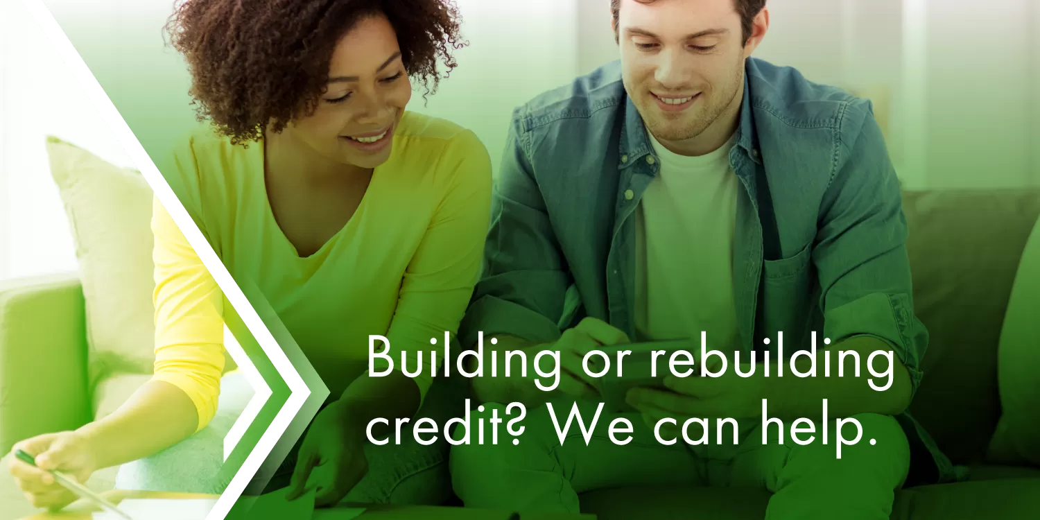 Smiling person using Fresh Start Saver Loan from First Financial to rebuild credit and save money